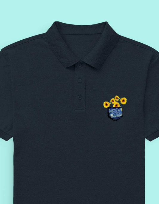 Black polo shirt with a colorful logo on a light blue background